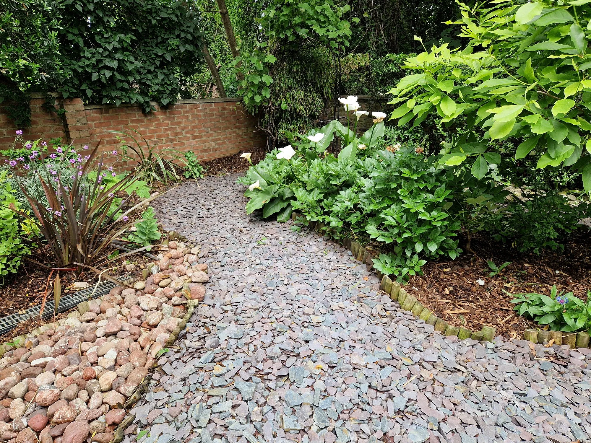 Garden borders and gravel pathway